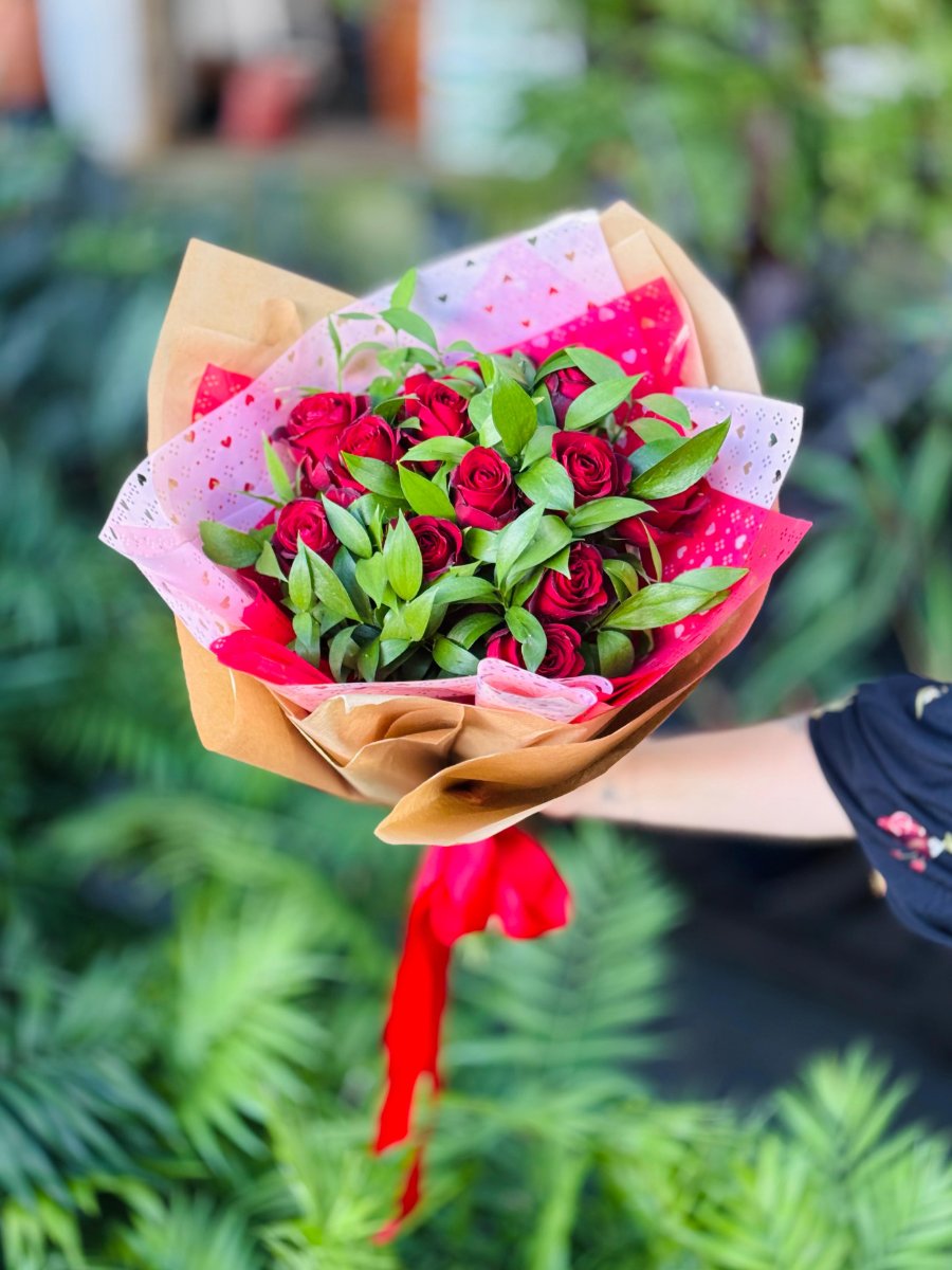 Buquê de rosas e ruscus